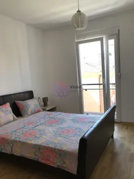 Bedroom with a double bed and access to the terrace. - image 15