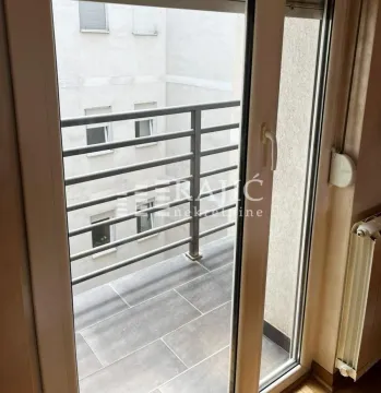 View of the terrace with tiled flooring and railing. - image 4