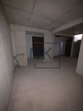 Empty space in rough construction phase with concrete walls and ceiling. - image 13
