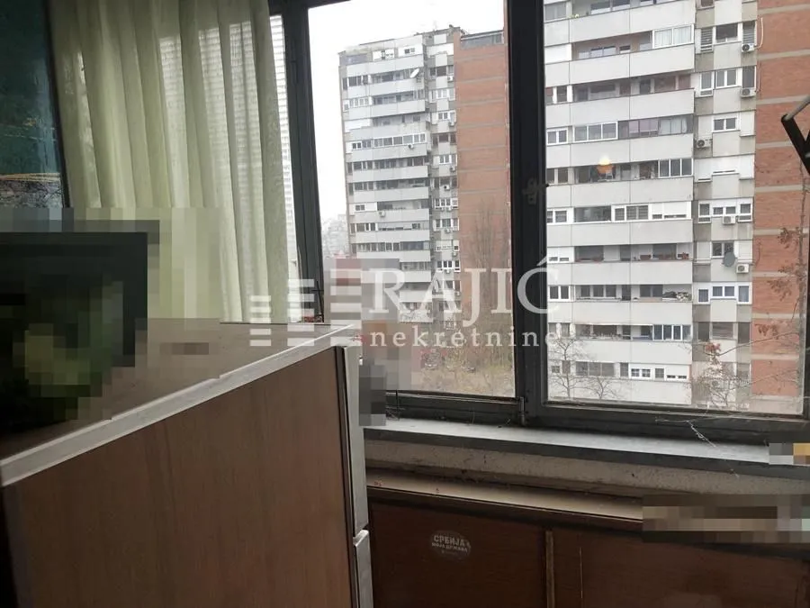 View through the window of surrounding residential buildings.