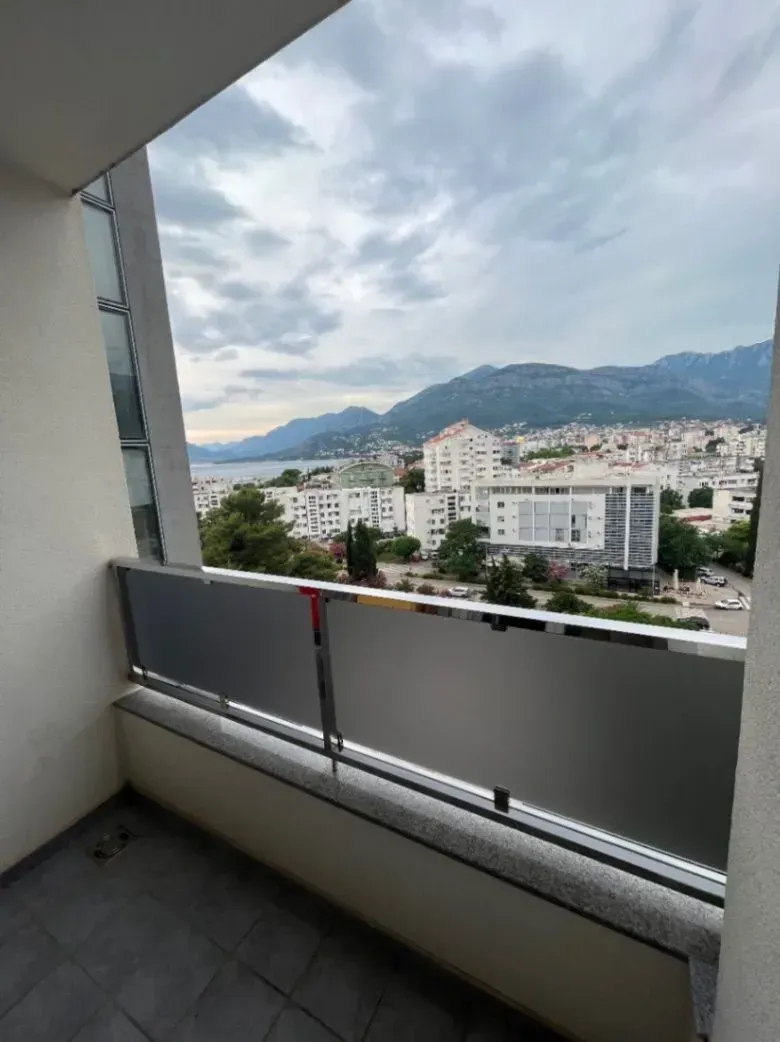View of the city and mountains from the balcony.