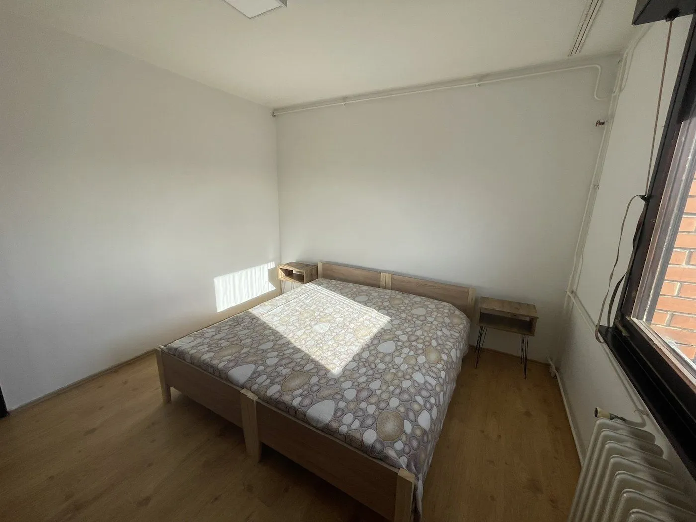 Bedroom with a double bed and bedside tables.