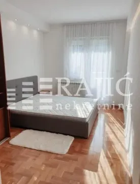 Furnished bedroom with a double bed. - image 2