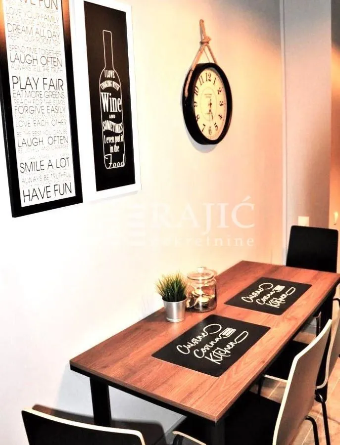 Dining table with chairs in the kitchen.