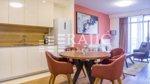 Modern living room with dining area and kitchen. - image 3