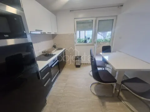 Kuhinja sa trpezarijom i izlazom na terasu. - image 3
