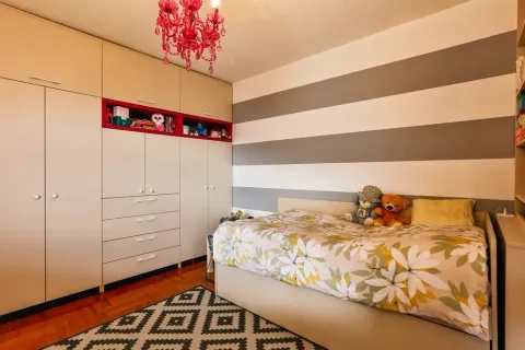 Children's bedroom with a bed and wardrobe. - image 22