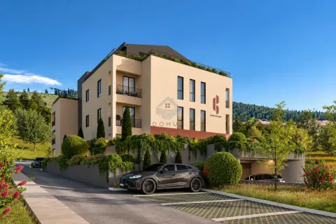 Exterior view of a modern residential building with landscaped yard and parking. - image 2