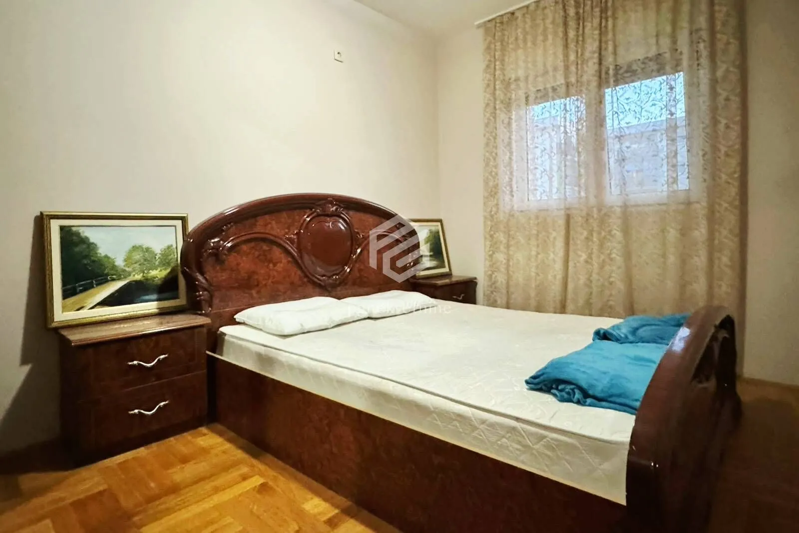 Bedroom with a double bed and bedside tables.