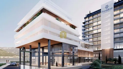 Spoljašnji izgled modernog hotelsko-stambenog kompleksa sa uređenim dvorištem. - image 9