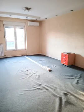 Empty room with a window and an air conditioner. - image 10