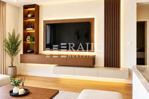 Modern living room with a TV unit and ambient lighting. - image 3