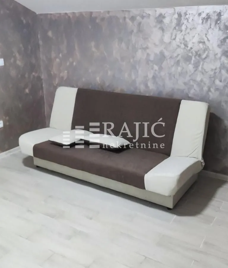 Living room with a sofa.