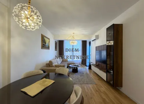 Modern living room with a sofa set and dining table. - image 5