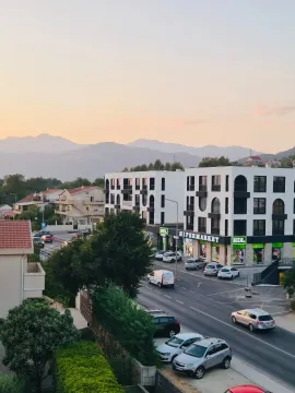 View from the terrace of the city neighborhood and mountains in the background. - image 8