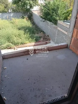 Unfinished balcony overlooking the yard under construction. - image 11