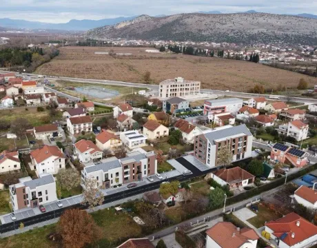 Aerial view of newly constructed residential buildings and the surrounding neighborhood. - image 2