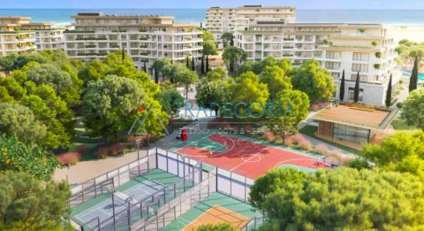 Pogled iz vazduha na stambeni kompleks sa sportskim terenima i uređenim zelenilom. - image 5