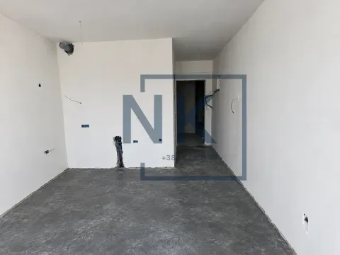 Unfurnished room in rough construction phase with white walls. - image 3