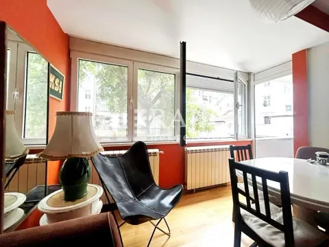 Living room with dining area and terrace access. - image 5