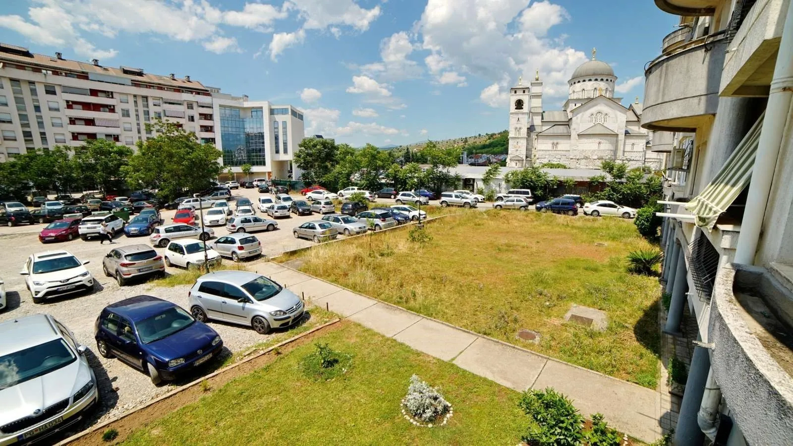 View from the balcony overlooking the surrounding area and cathedral in Podgorica.