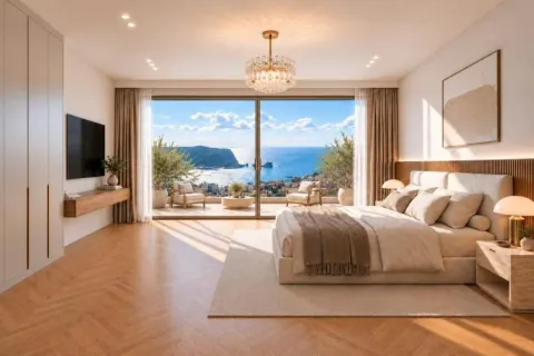 Spacious bedroom with a large double bed, wardrobe, and a sea view. - image 5