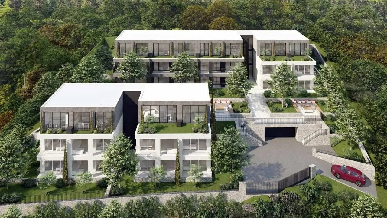 3D render stambenog kompleksa sa uređenim dvorištem i zelenilom.