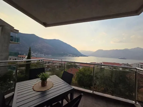 Furnished balcony with seating set and sea and mountain view. - image 20