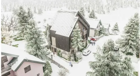 Pogled iz vazduha na planinsku kuću okruženu snijegom i zimskim pejzažom. - image 3