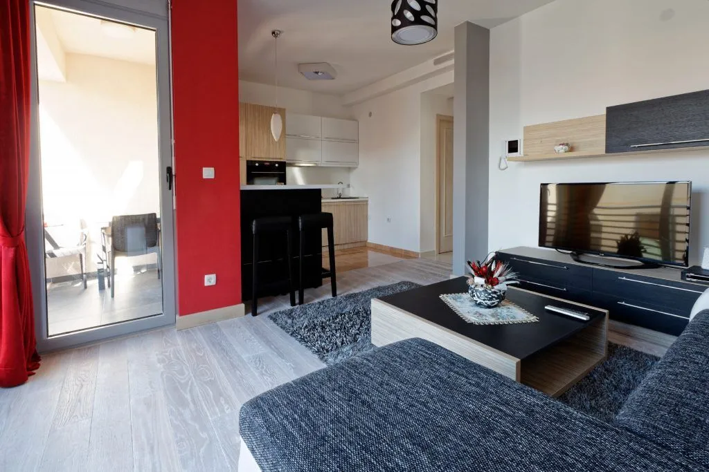 Living room connected to the dining area and kitchen.