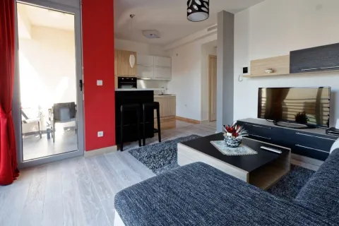 Living room connected to the dining area and kitchen. - image 5