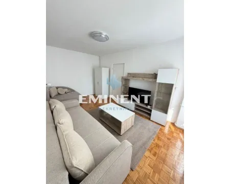 Living room with sofa, coffee table and TV unit. - image 7