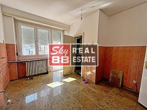 Empty room with tiled walls and a window. - image 14