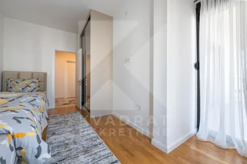 Furnished bedroom with a double bed, wardrobe, and access to the terrace. - image 12