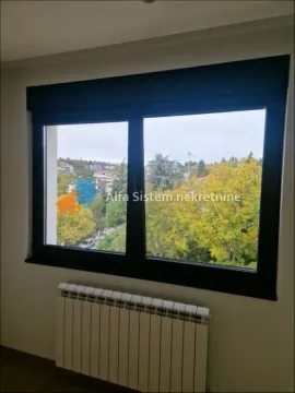 View through the window with a radiator underneath. - image 7