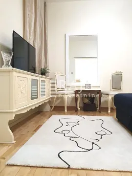 Living room with furniture, sideboard, and dining table. - image 6
