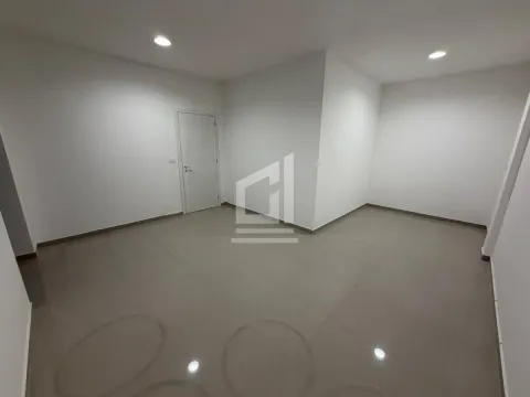 Empty unfurnished room with white walls and tiled flooring. - image 4