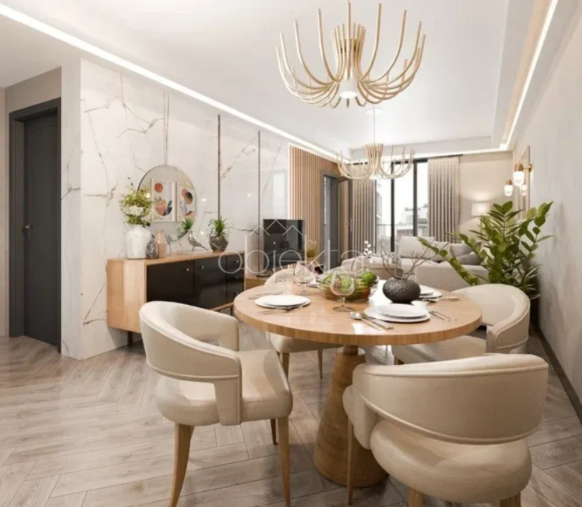Living room with dining area and modern furniture.