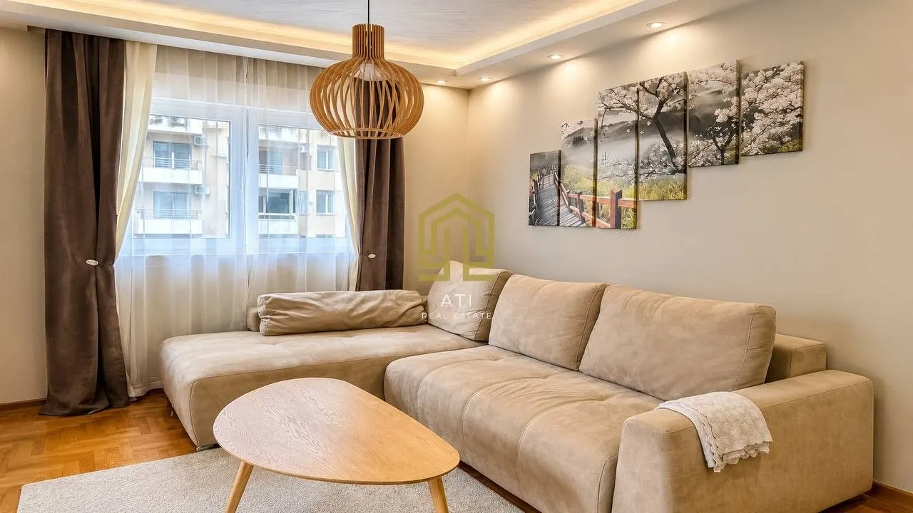 Living room with a sectional sofa and table.