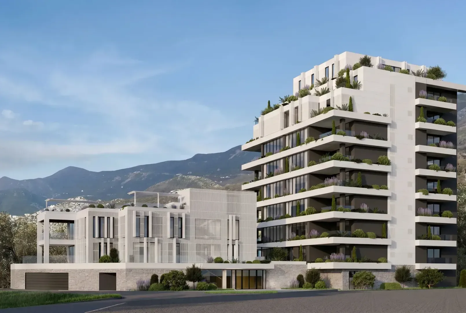 Spoljašnji izgled moderne stambene zgrade sa terasama i uređenim okruženjem.