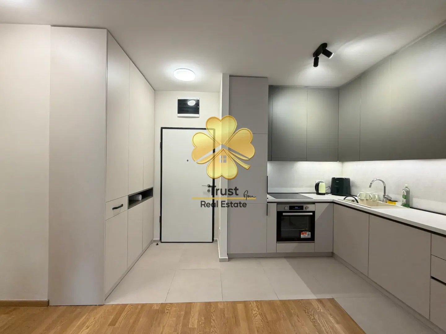 Modern kitchen with built-in units and bright interior.