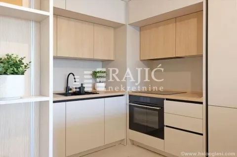 Modern kitchen with built-in units and appliances. - image 3