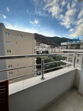 View from the balcony overlooking the city and surrounding hills. - image 4