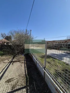 Fenced yard and property entrance. - image 7
