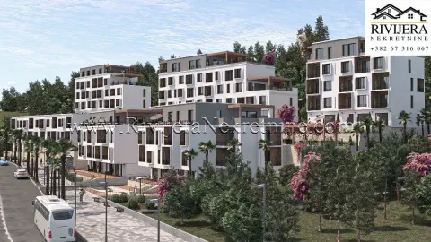 Spoljašnji izgled modernog stambenog kompleksa sa uređenim dvoriijem i zelenilom. - image 14