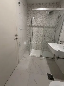 Modernly equipped bathroom with a shower cabin. - image 10