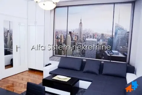 Living room with a sectional sofa and a large window with a city view. - image 9