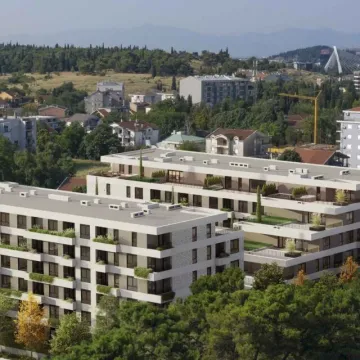 Spoljašnji izgled modernih stambenih zgrada sa okolnim zelenilom. - image 3