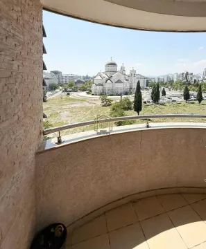 View of the city and church from the balcony. - image 3