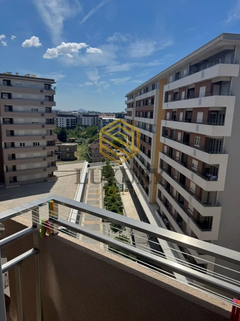 View from the terrace overlooking neighboring residential buildings and the neighborhood.